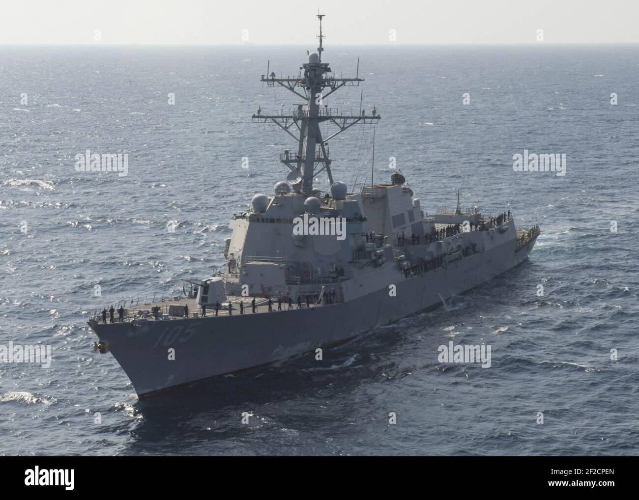 Port bow view of USS Dewey (DDG 105) with sailors manning rails in Red ...