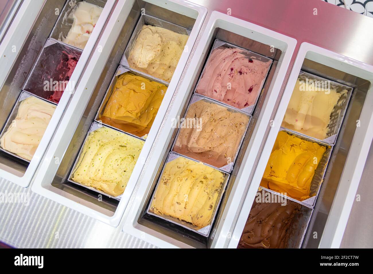 Ice cream in showcase fridge at confectionery shop Stock Photo Alamy