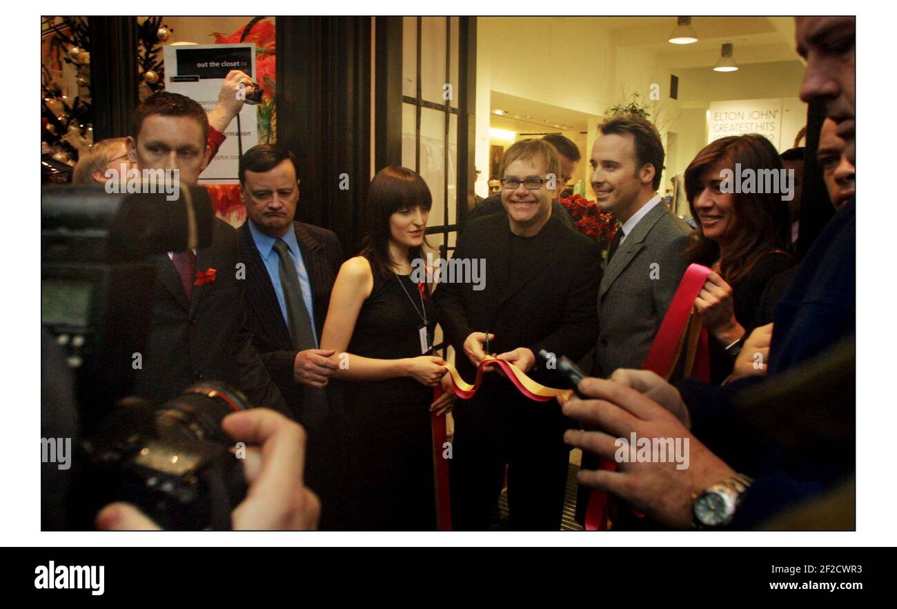 'OUT THE CLOSET lV.' opening...... Elton John and David Furnish