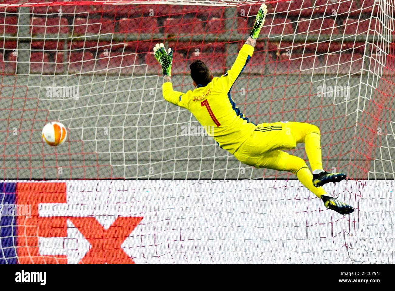 Olympiacos goalkeeper Pedro Jose Sa fails to stop Arsenal's Martin Odegaard (not pictured) from scoring his side's first goal of the game during the UEFA Europa League round of sixteen, first leg match at the Karaiskakis Stadium, Greece. Picture date: Thursday March 11, 2021. Stock Photo