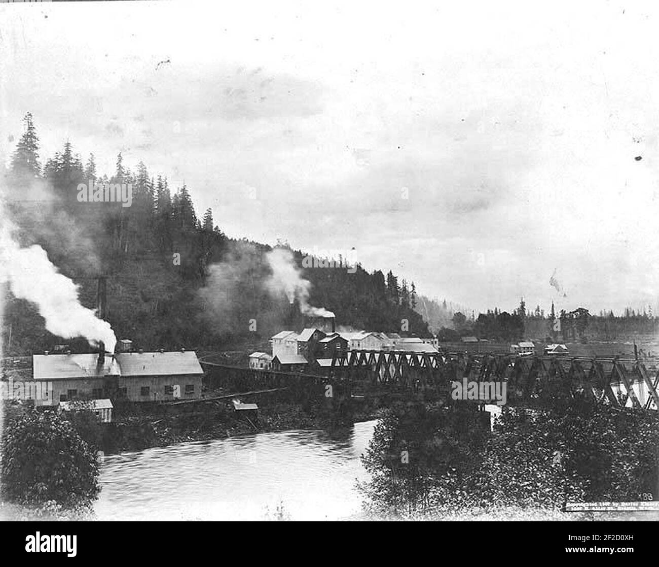 Portland Cement Co and Great Northern Railway bridge spanning the Baker River, Cement City, Washington, ca 1907 (WASTATE 1137). Stock Photo