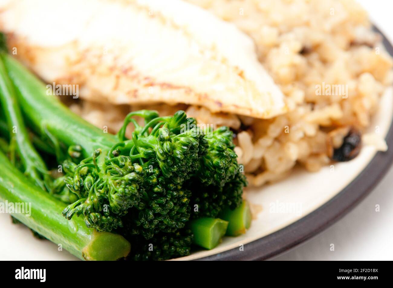 Fish Rice Brocoli Tasty broccolini on the plate with fish and rice Stock Photo - Alamy