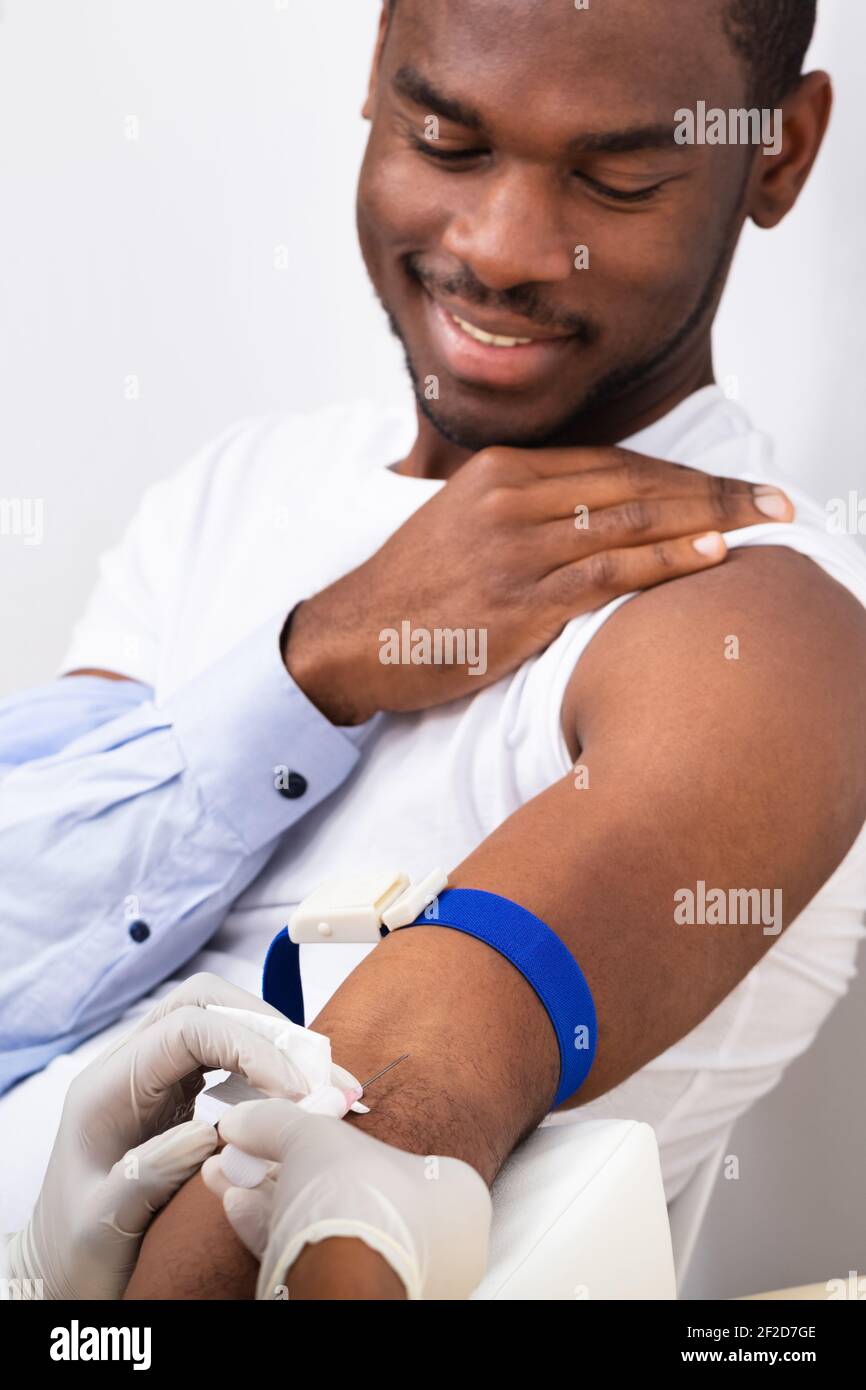 African Patient Blood Test By Doctor Or Donation Stock Photo