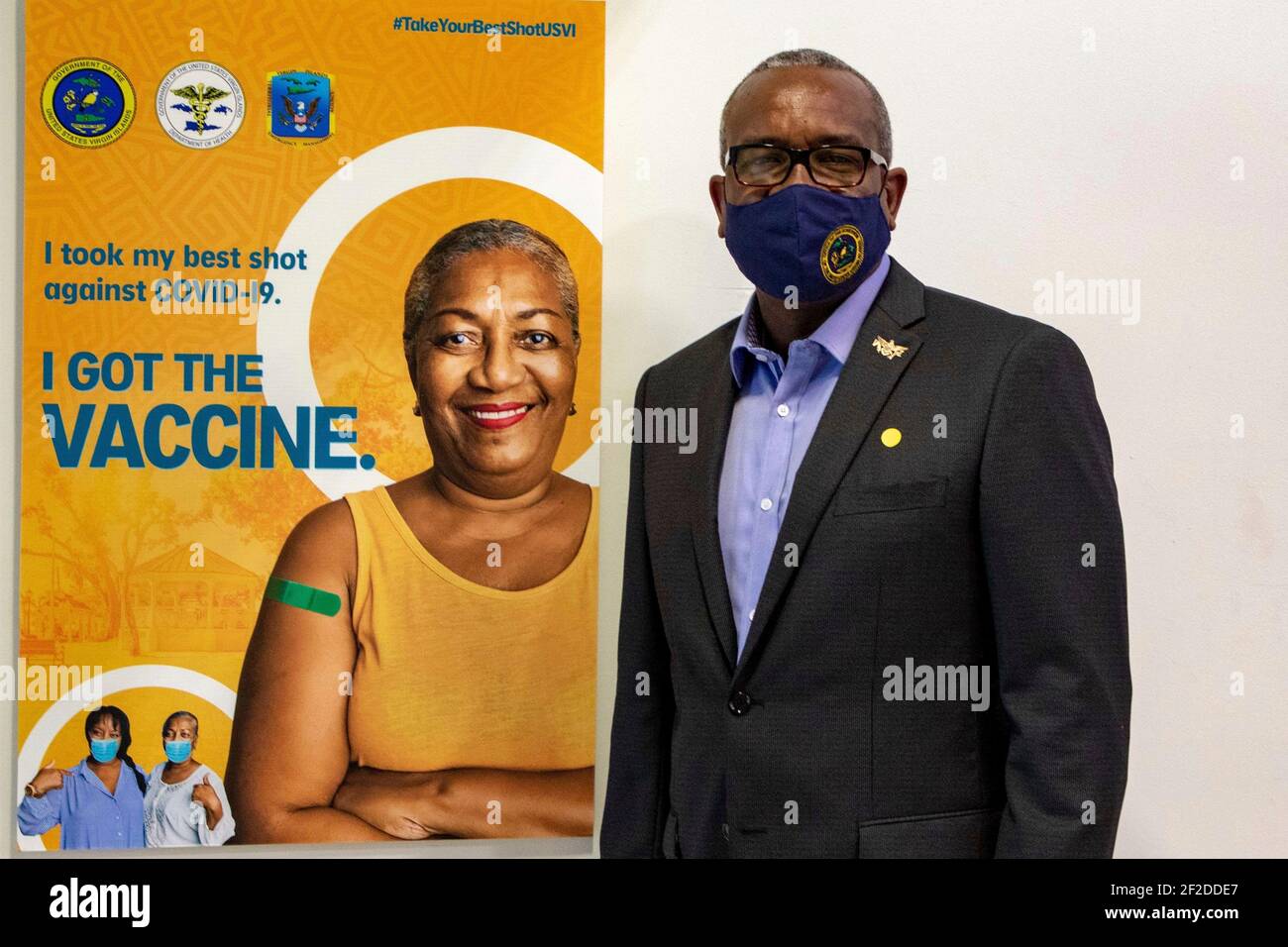 U.S. Virgin Islands Governor Albert Bryan Jr., poses in front of the post-vaccination selfie station at the territorially-led, federally-supported COVID-19 Community Vaccination Center March 11, 2021 in St. Thomas, U.S Virgin Islands. Credit: Planetpix/Alamy Live News Stock Photo