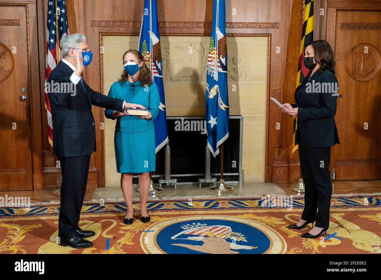 Washington, United States Of America. 11th Mar, 2021. U.S Vice President Kamala Harris, holds a ceremonial swearing-in for Attorney general Merrick Garland, as his wife Lynn Garland holds the bible, at the Department of Justice March 11, 2021 in Washington, DC Credit: Planetpix/Alamy Live News Stock Photo