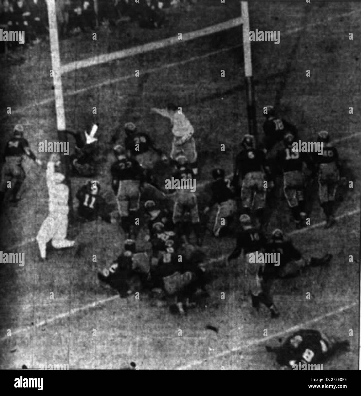 Picture from the 1922 Princeton v. Chicago football game. Chicago was about to go up 18–7 about to score again when it fumbled and Princeton got a touchdown. The arrow points to Gray of Princeton scoring. Stock Photo
