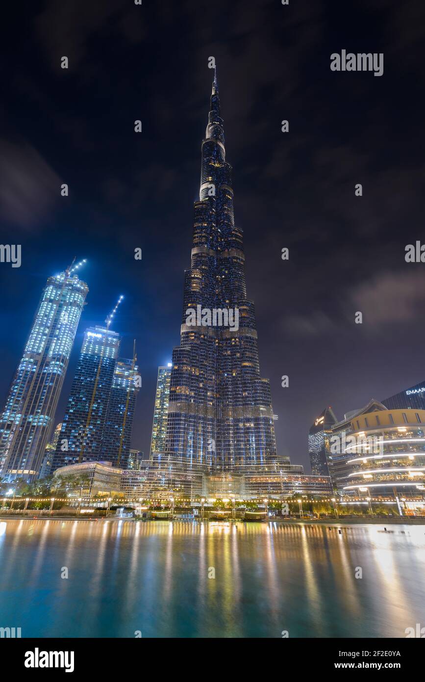 Burj Khalifa skyscraper at night in Dubai, United Arab Emirates, the tallest building ever built. Vertical photo of highrise formerly named Burj Dubai. Stock Photo