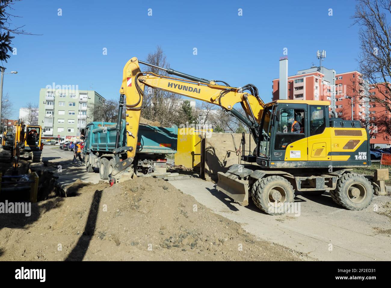 Workers are laying pipes for a new sewer as part of the Velika Gorica Agglomeration project Stock Photo