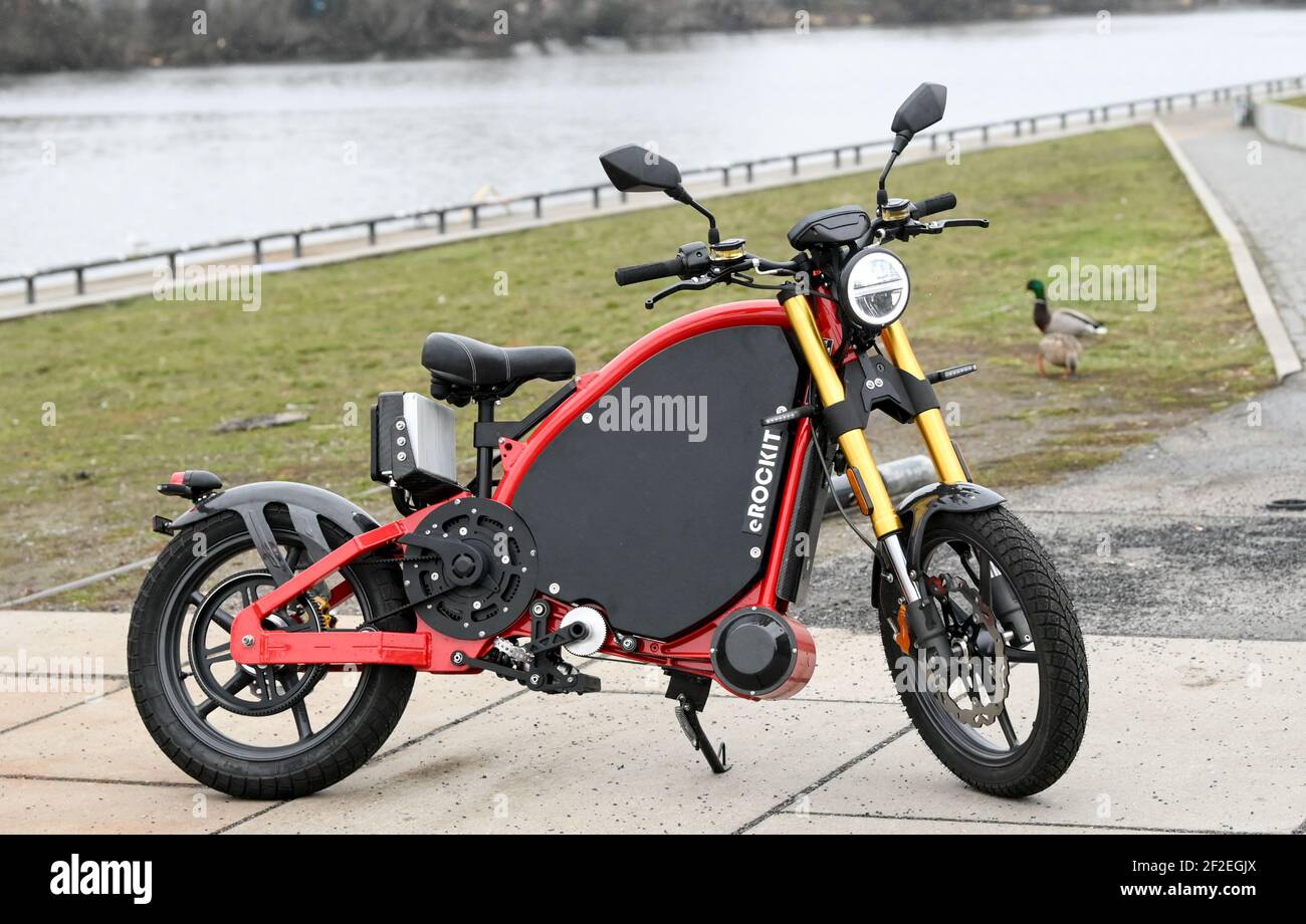 Berlin, Germany. 11th Mar, 2021. The pedal-controlled electric motorcycle  eROCKIT at the official presentation on the banks of the Spree. The  so-called Human Hybrid multiplies muscle power up to 50 times when