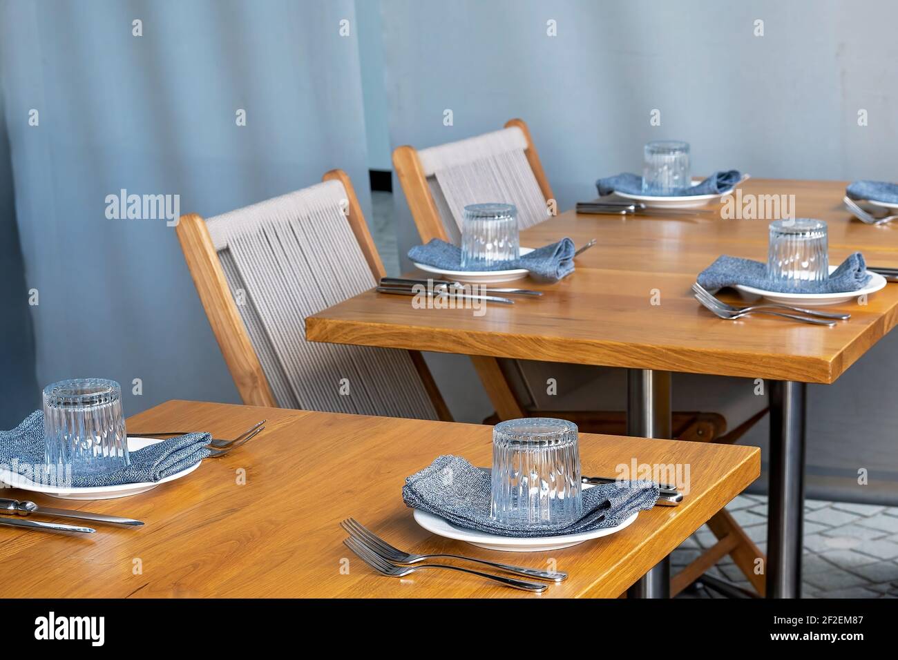 Restaurant tables and chairs set up for dining Stock Photo Alamy