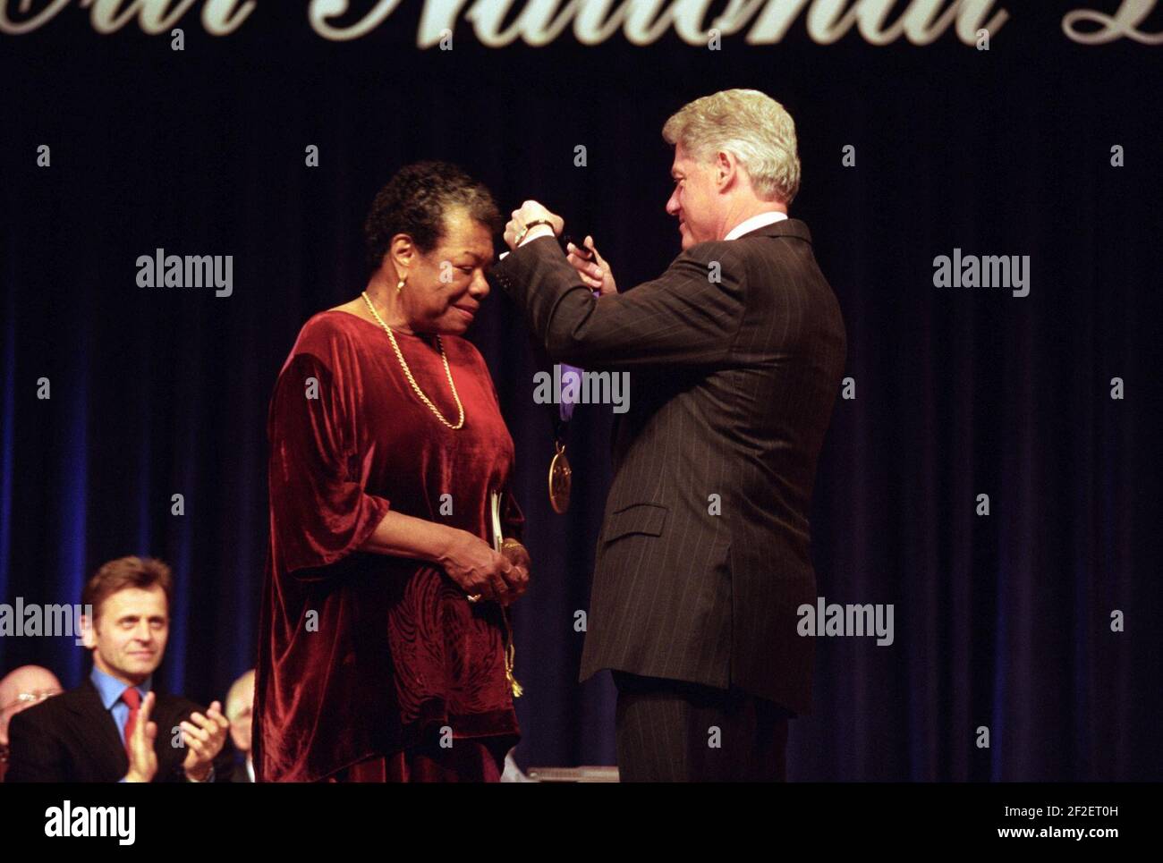 President Bill Clinton presents the National Medal of Arts and Humanities  Award to Maya Angelou Stock Photo - Alamy