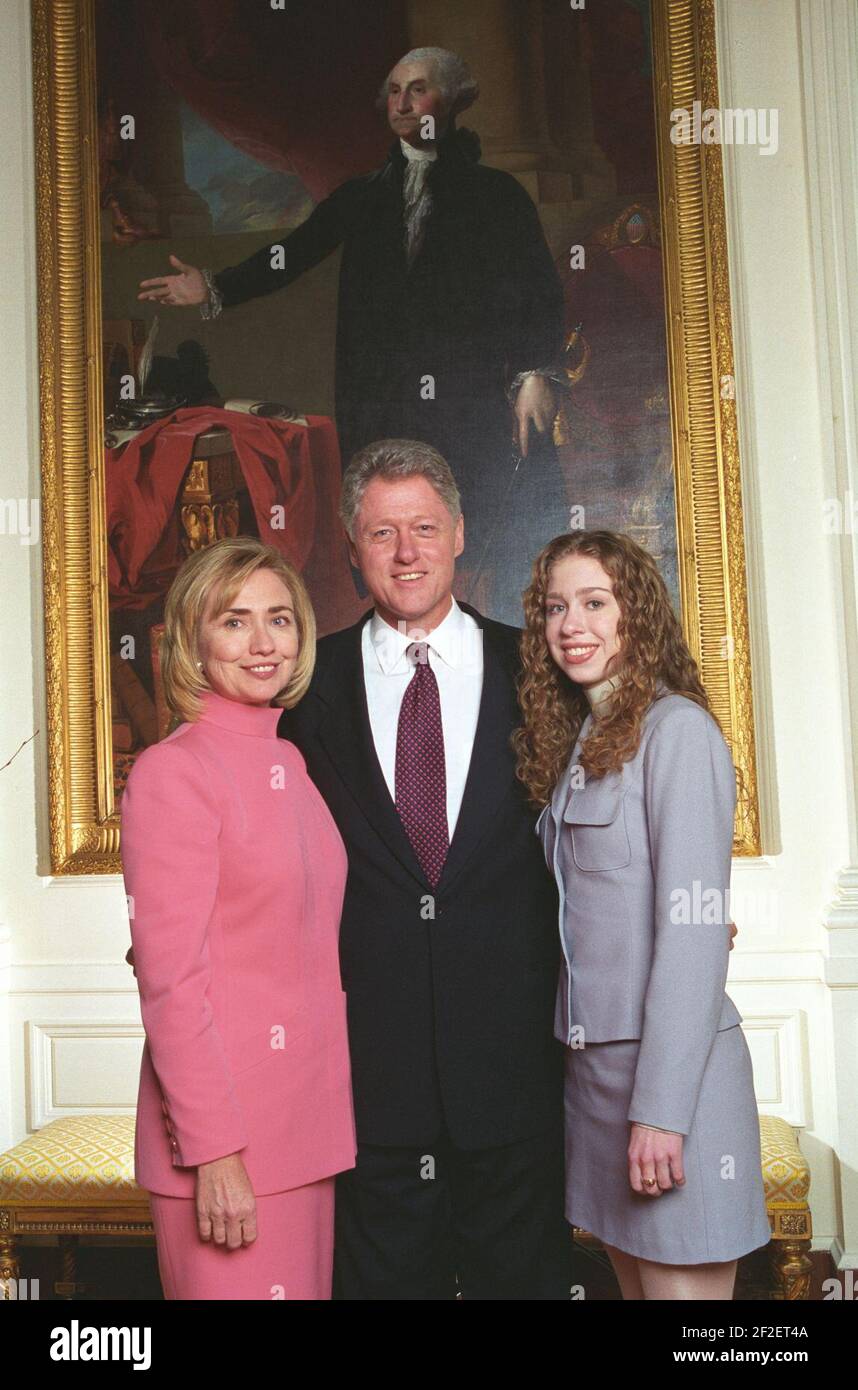 President Bill Clinton, First Lady Hillary Clinton, And Daughter Chelsea Clinton Pose For