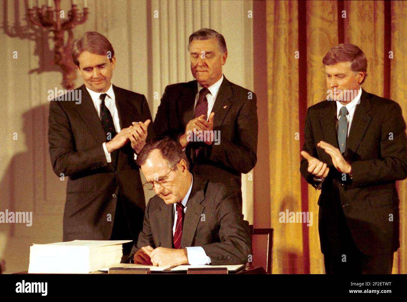 President George H. W. Bush signs the Clean Air Act Amendments Stock ...