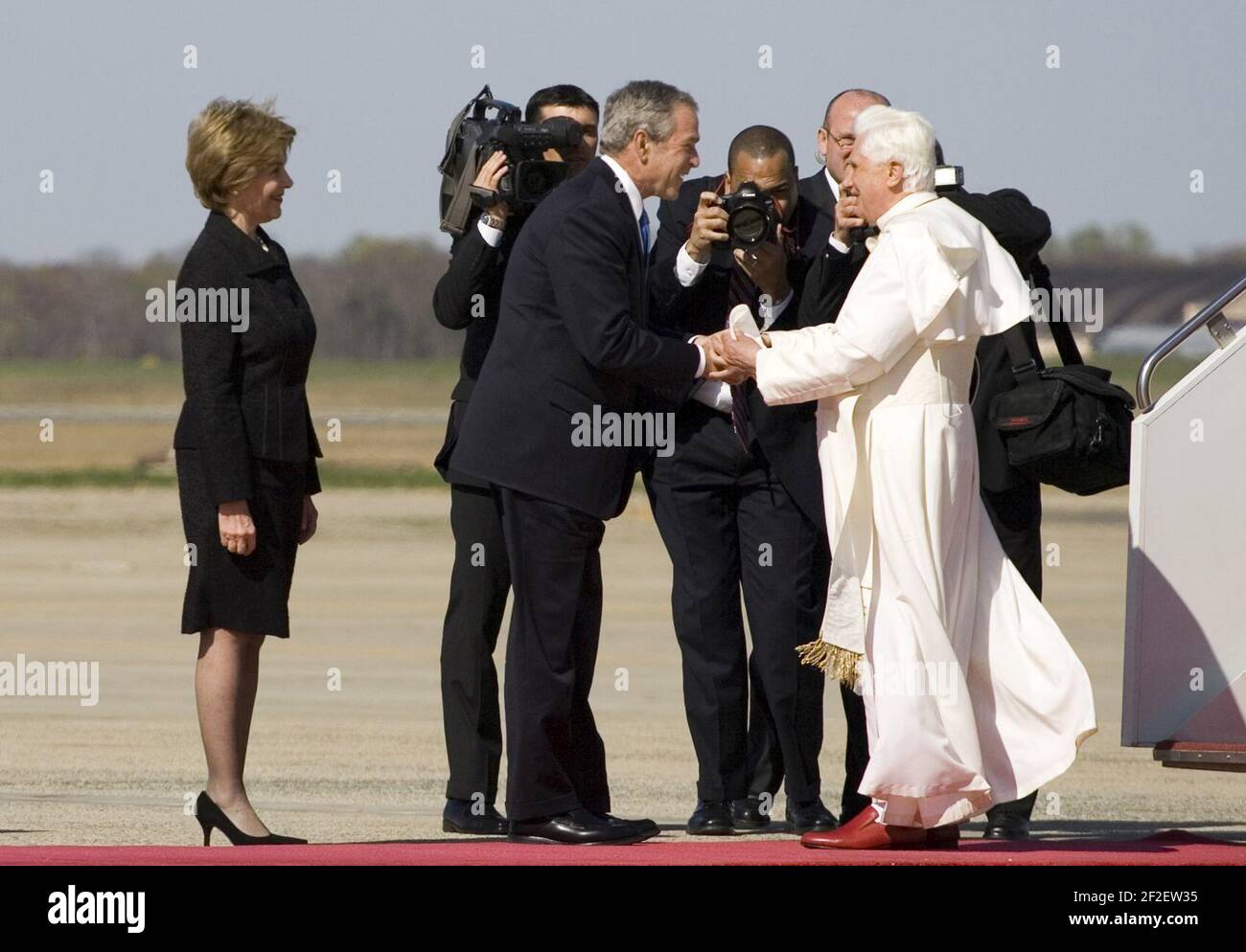 President George W. Bush and Laura Bush greet Pope Benedict XVI on his arrival at Andrews Air Force Base, Maryland. Stock Photo