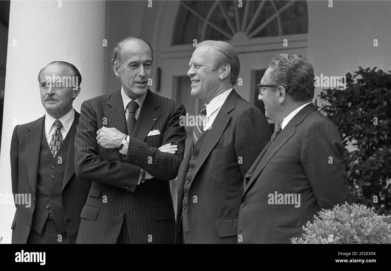 President Gerald Ford, French President Valery Giscard, Henry Kissinger, and Jean Sauvagnargues. Stock Photo