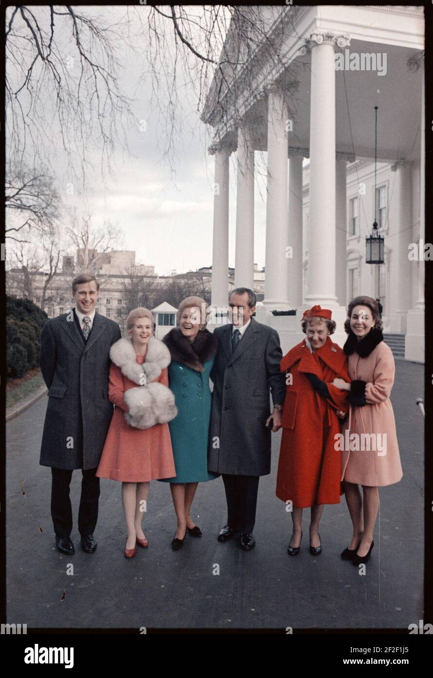 President Richard Nixon, Pat Nixon, Mamie Eisenhower, Julie Nixon Eisenhower, Tricia Nixon Cox and Ed Cox following the 1973 Inaugural Parade. Stock Photo