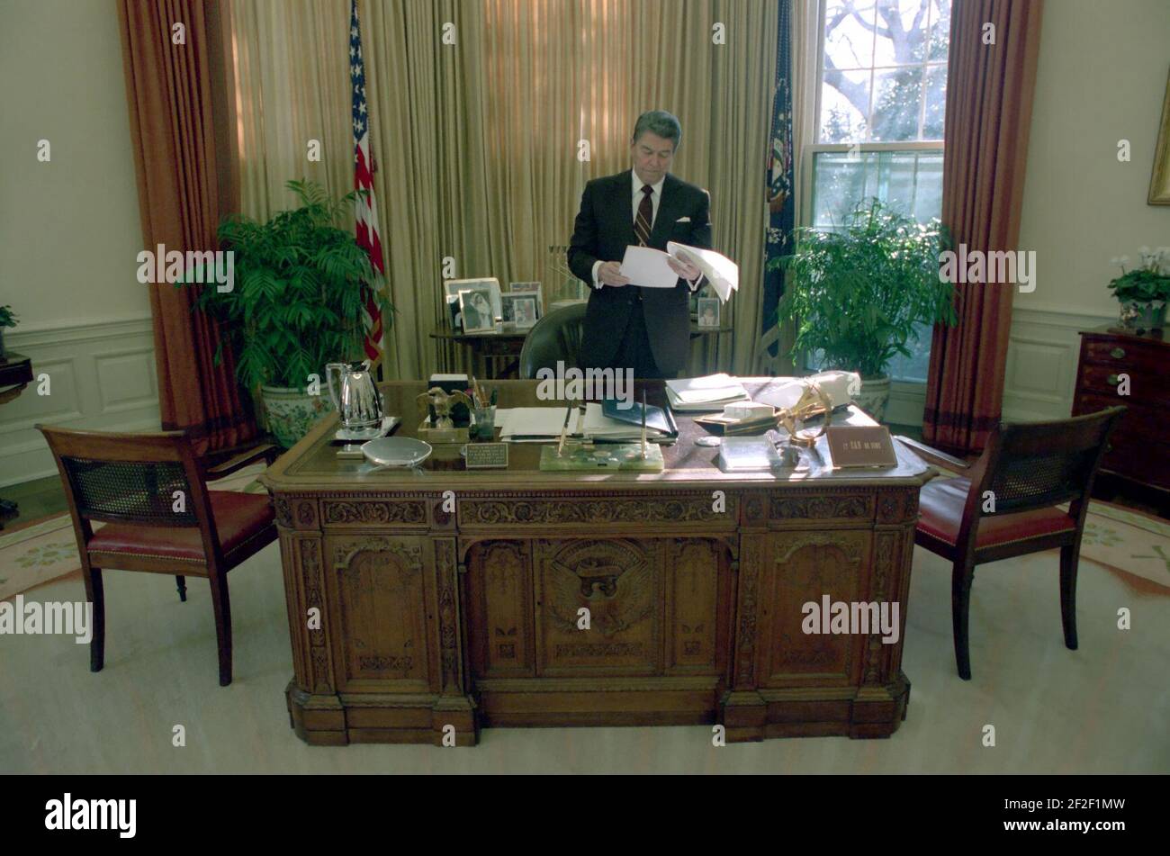 President Ronald Reagan alone in the Oval Office. Stock Photo