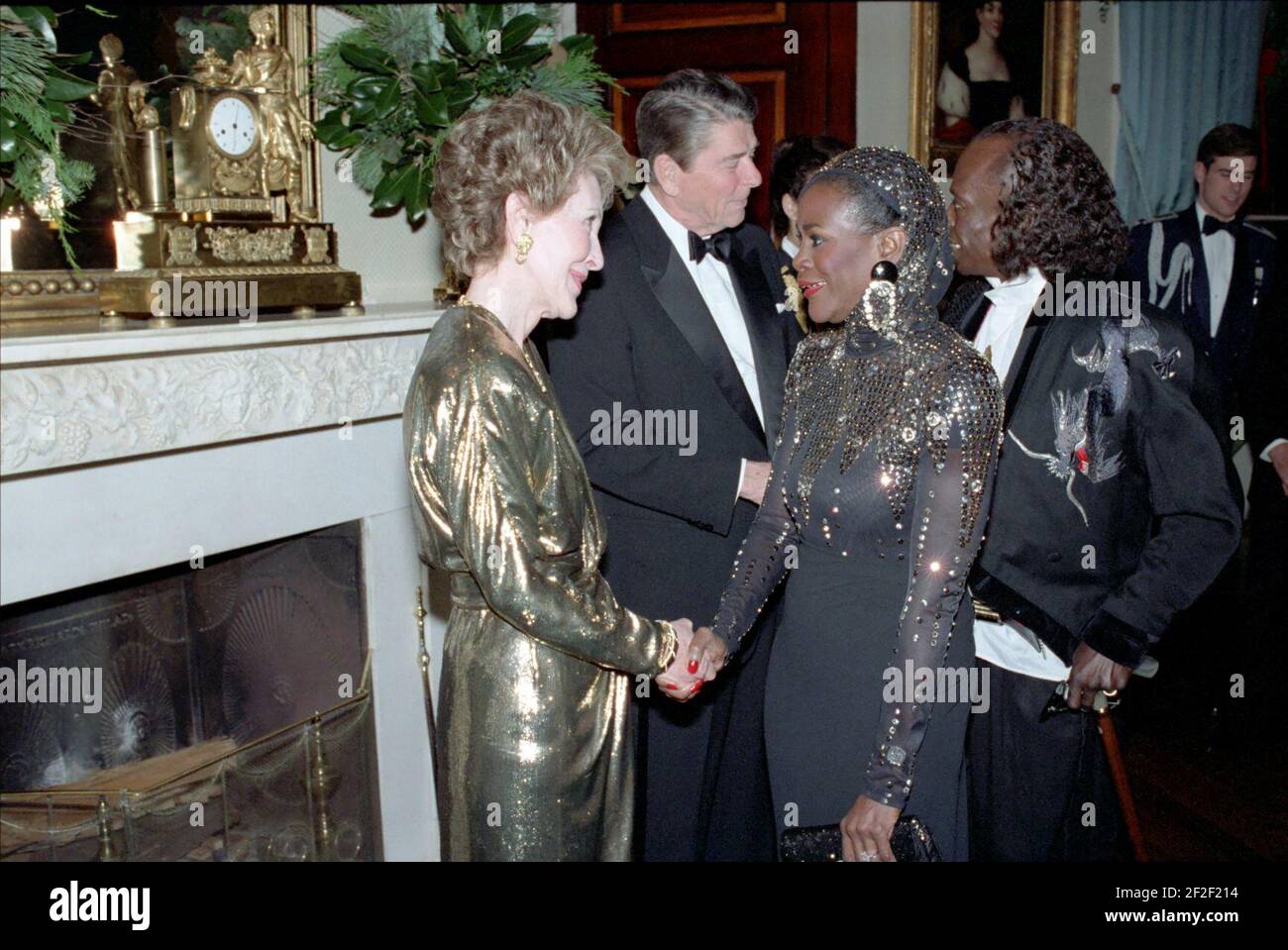 President Ronald Reagan and Nancy Reagan greet Miles Davis and Cicely Tyson. Stock Photo