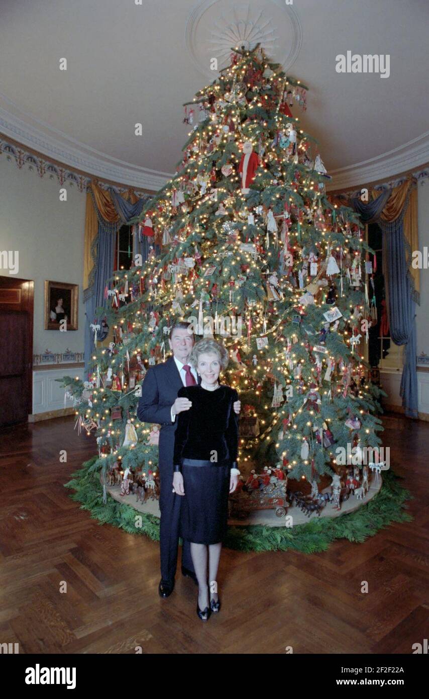 President Ronald Reagan and Nancy Reagan posing for photos with White