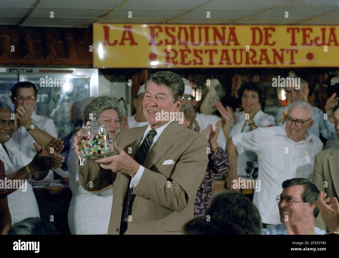 President Ronald Reagan holding a jelly bean jar Stock Photo Alamy