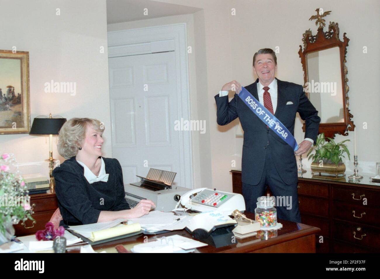 President Ronald Reagan receiving Boss of the Year gift from Kathy Osborne. Stock Photo