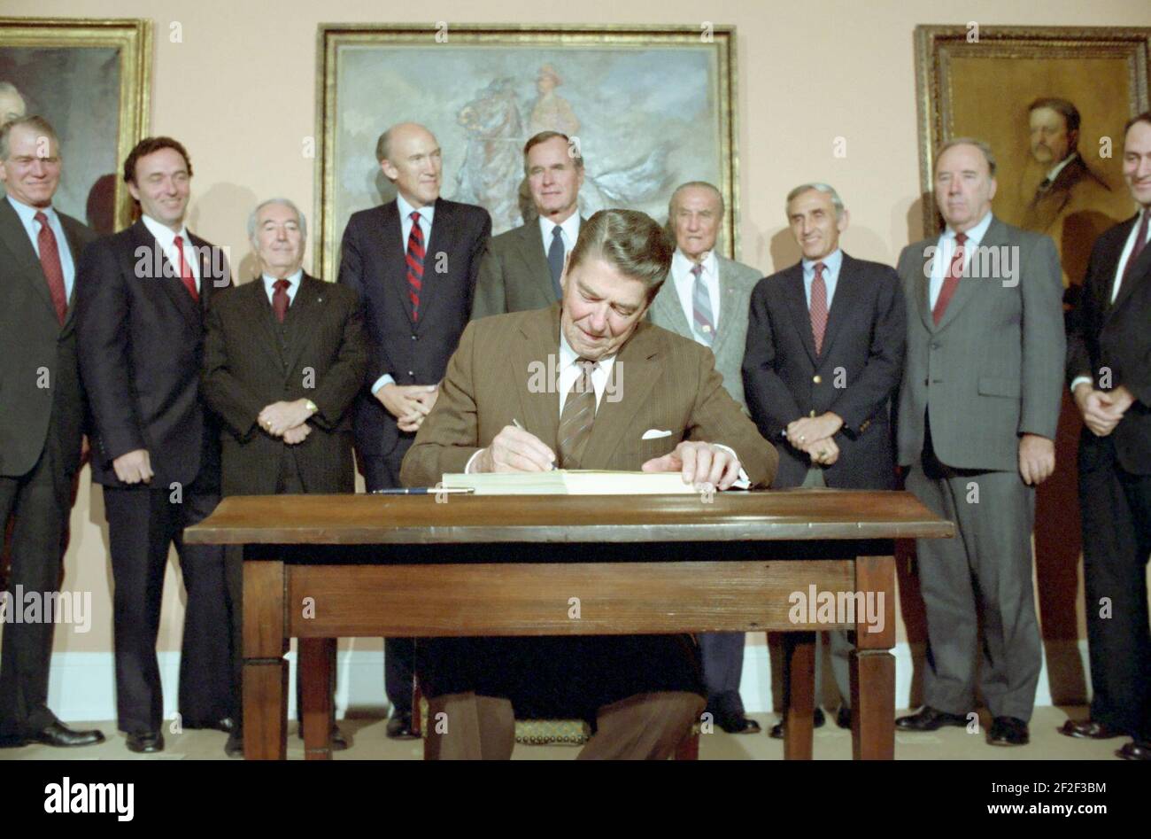 President Ronald Reagan signing the Immigration Reform and Control Act of 1986. Stock Photo