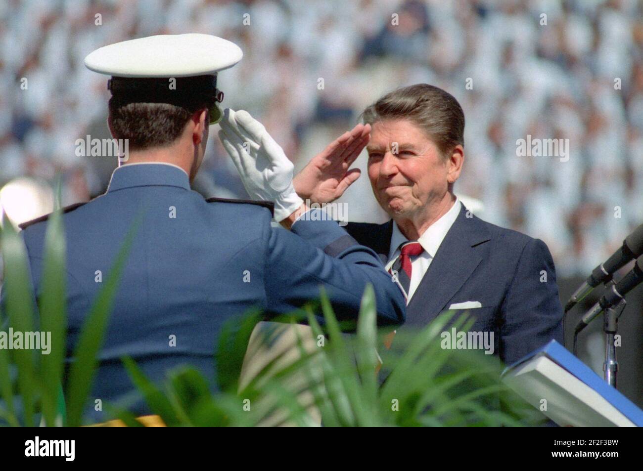 President Ronald Reagan Salutes an Air Force Cadet at the United States Air Force Academy Commencement in Colorado Springs, Colorado. Stock Photo