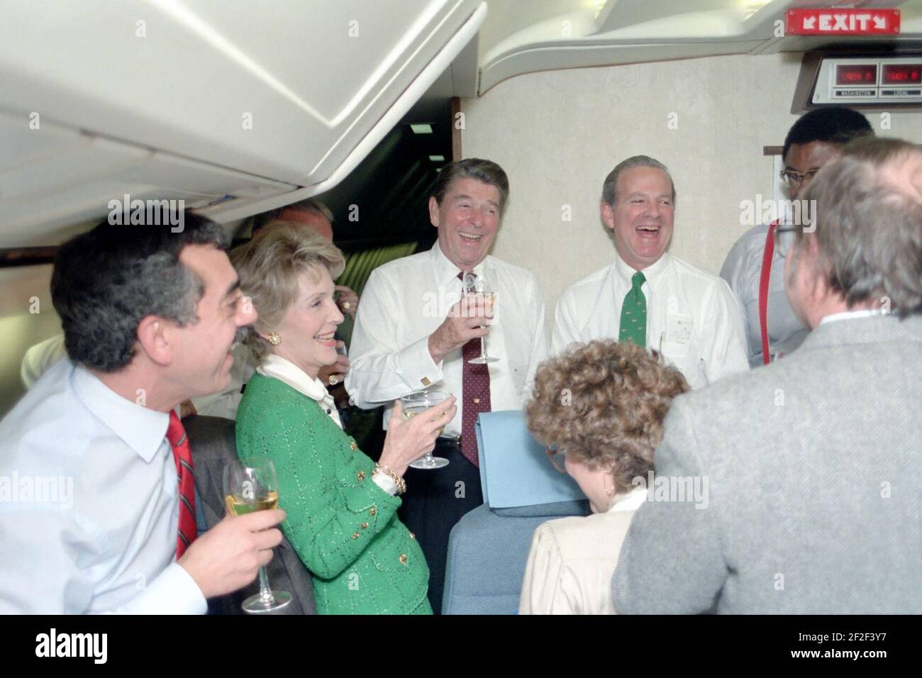 President Ronald Reagan, Nancy Reagan, James Baker, Ken Khachigian, Rosie Greer, and Lou Cannon celebrating the end of the 1984 presidential campaign. Stock Photo