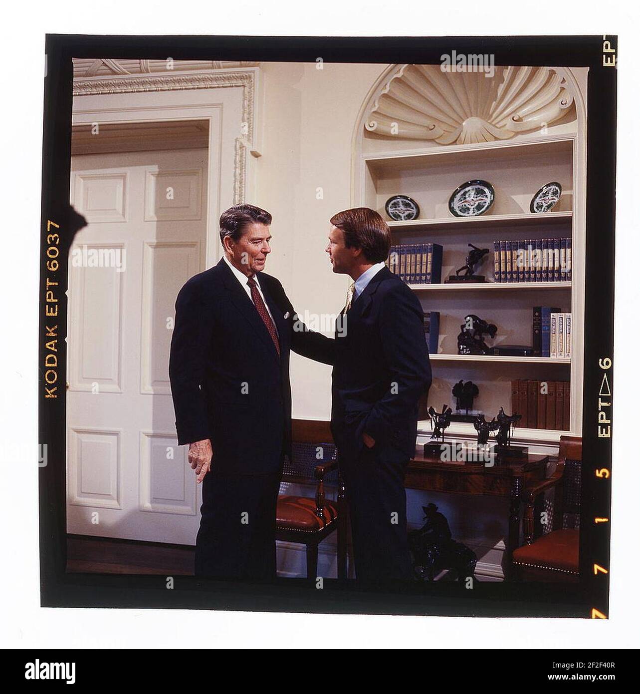 President Ronald Reagan, in the Oval Office, shaking hands with Republican senator Don Nickles of Oklahoma. Stock Photo