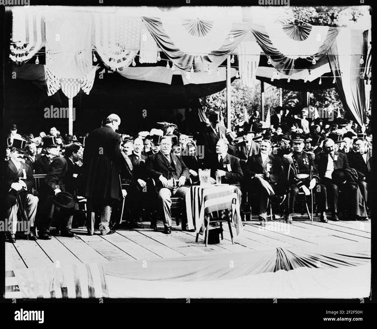 President William Howard Taft and others seated on stage at event ...
