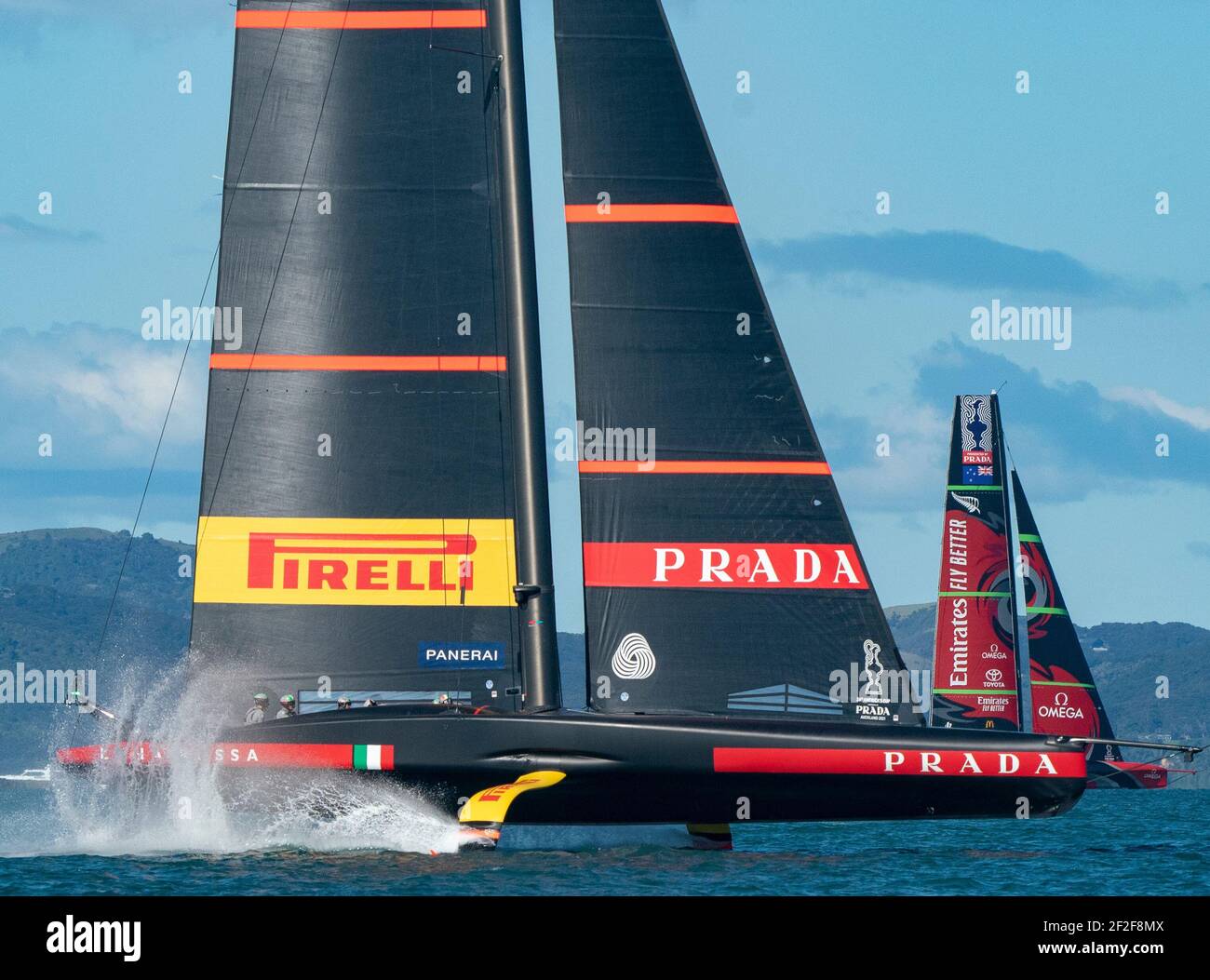 Auckland, New Zealand, 12 March, 2021 -  Defender's  Emirates Team New Zealand (ETNZ), skippered by Peter Burling on Te Rehutai and Italian challengers Luna Rossa Prada Pirelli, co-helmed by Jimmy Spithill and Francesco Bruni on Luna Rossa, during Day 2, Race 3, of the 36th America's Cup.  Credit: Rob Taggart/Alamy Live News Stock Photo