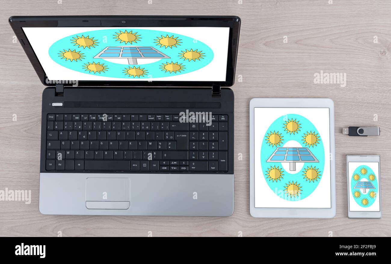 Clean energy concept shown on different information technology devices Stock Photo