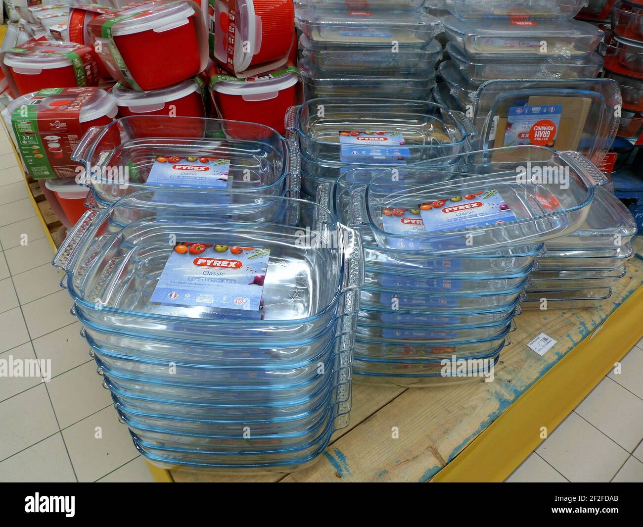 COLORFUL PLASTIC BOXES FOR FOOD FOR SALE INSIDE A MEGA STORE Stock