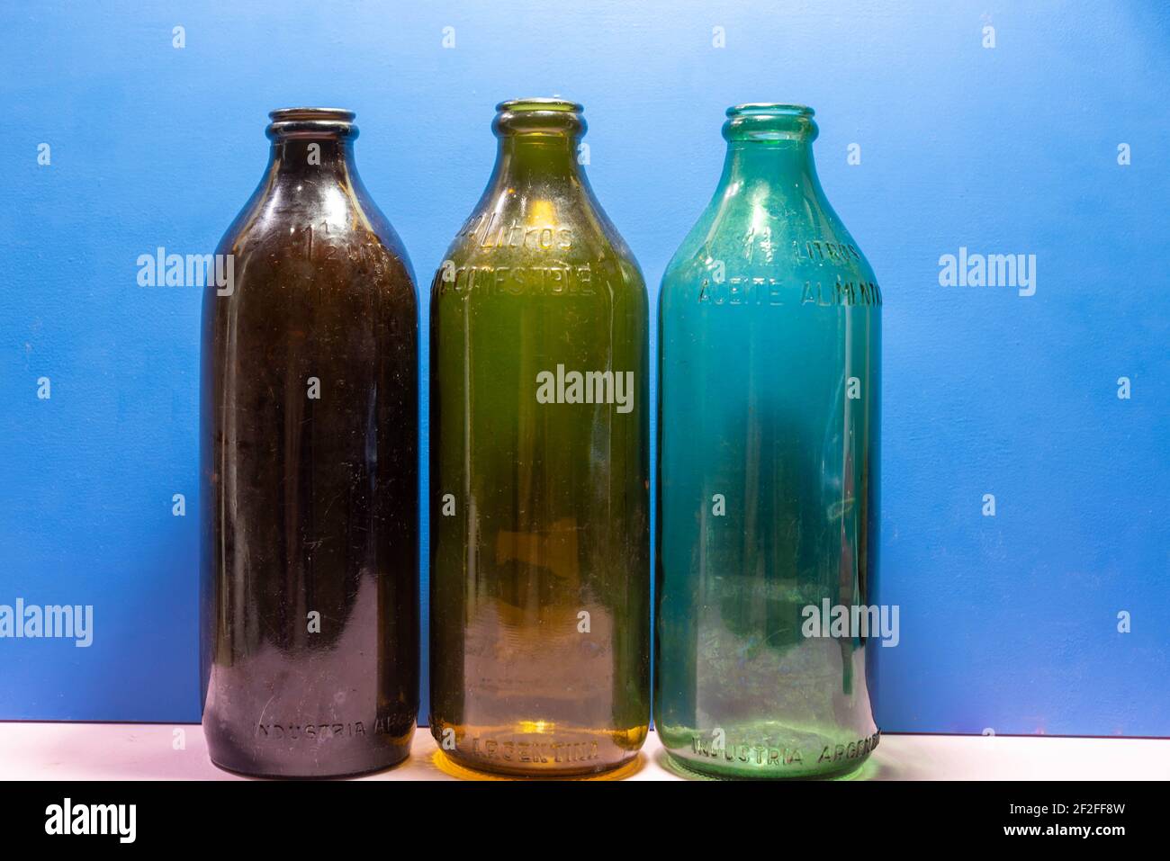 Old glass bottles. Edible oil storage bottle. one and a half bottles of
