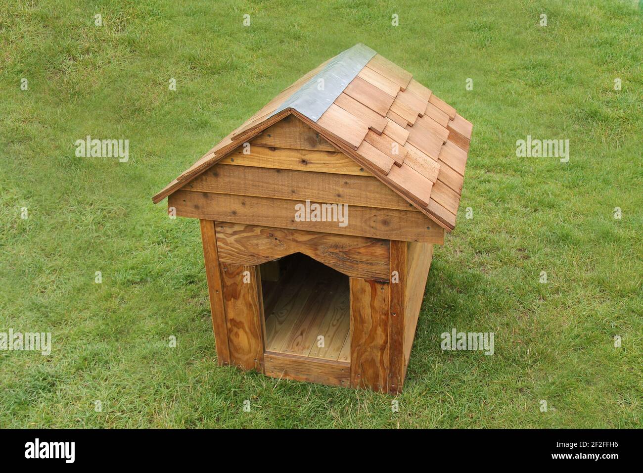 A New Wooden Dog Kennel in a Grass Meadow Stock Photo Alamy