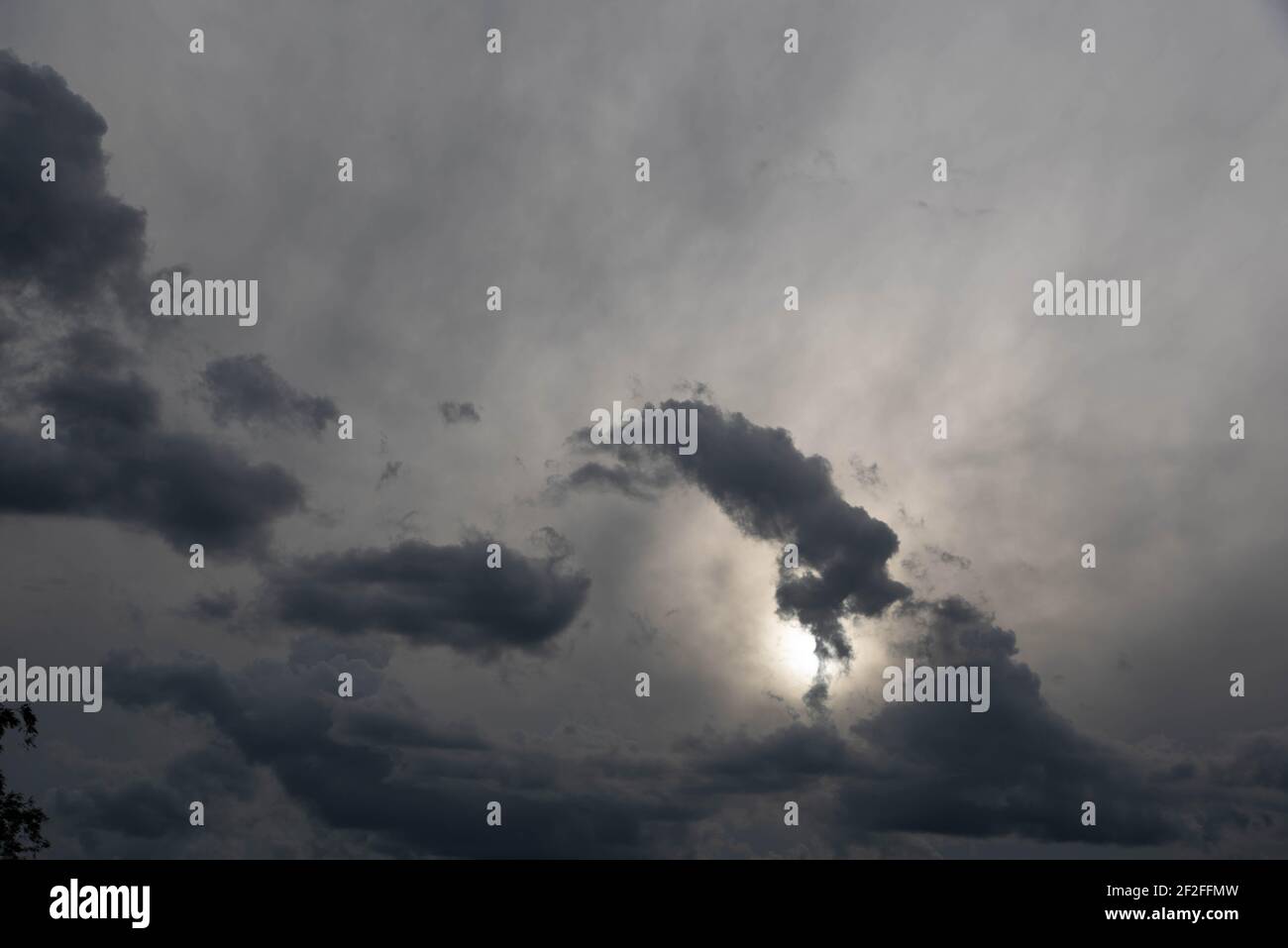 Colorful rain clouds at dusk. Rain-forming clouds. Sunset in the skies ...