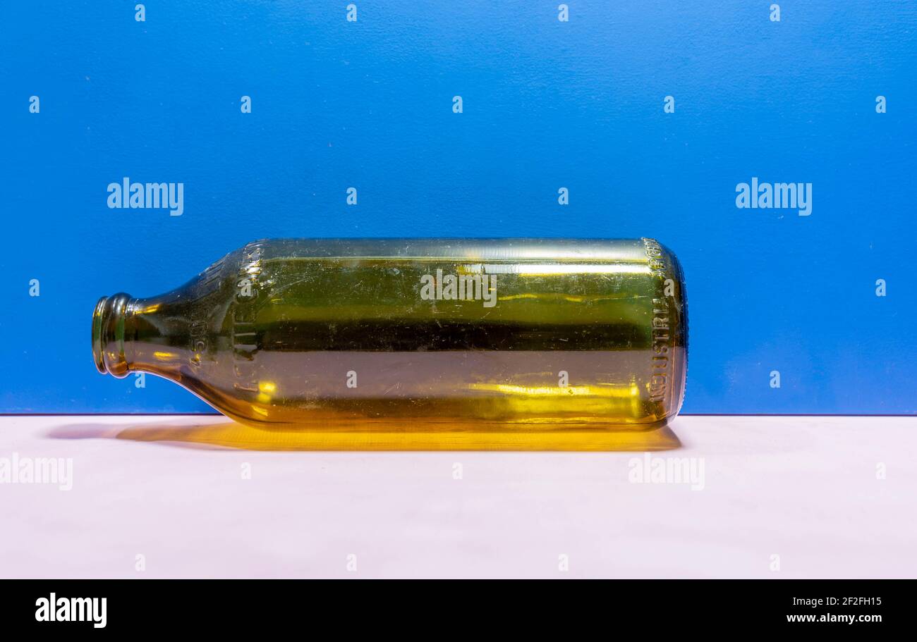 Old glass bottle. Edible oil storage bottle. one and a half olive oil