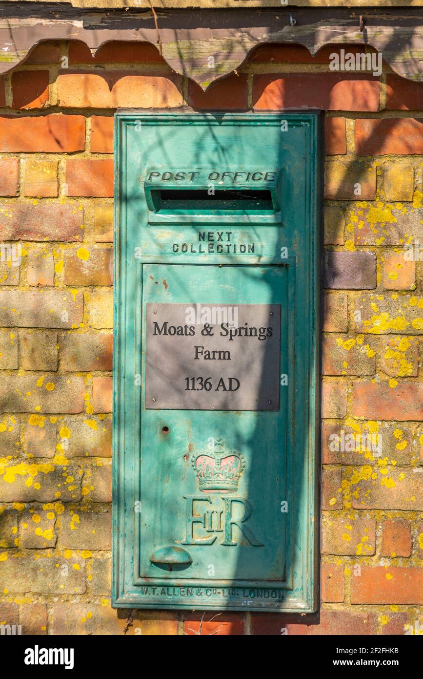 Moats & Springs Farm post office box, wall box. 17th century farmhouse in Great Stambridge countryside, Essex, UK. Site date 1136 AD. Stock Photo