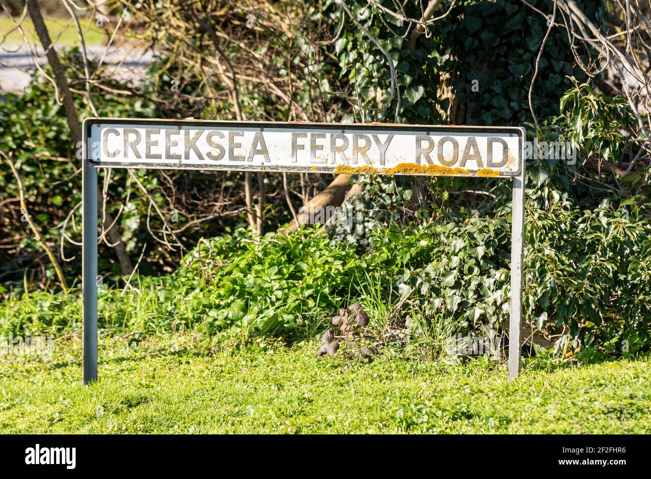 Creeksea Ferry Road street sign in Ballards Gore, Stambridge, Essex, UK Stock Photo