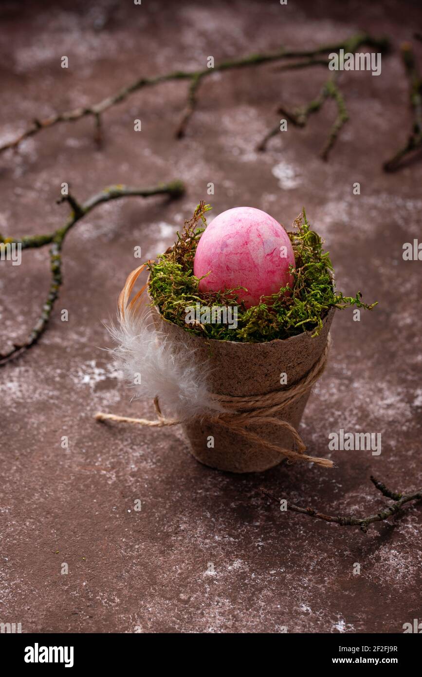 Red Easter egg painted with beetroot Stock Photo