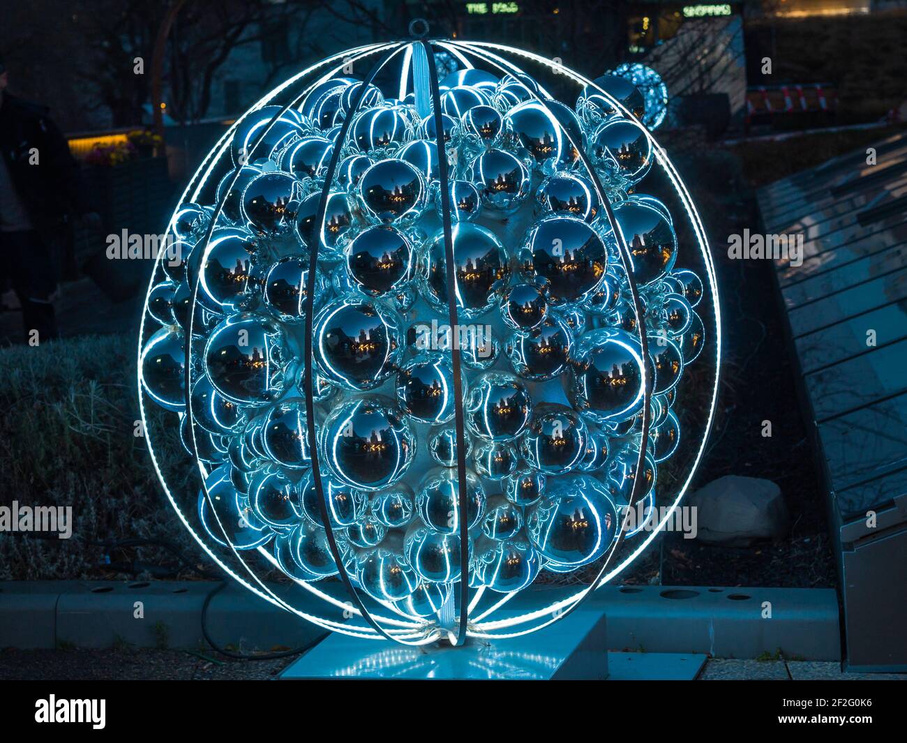 Huge blue illuminated christmas ball - christmas decoration Stock Photo