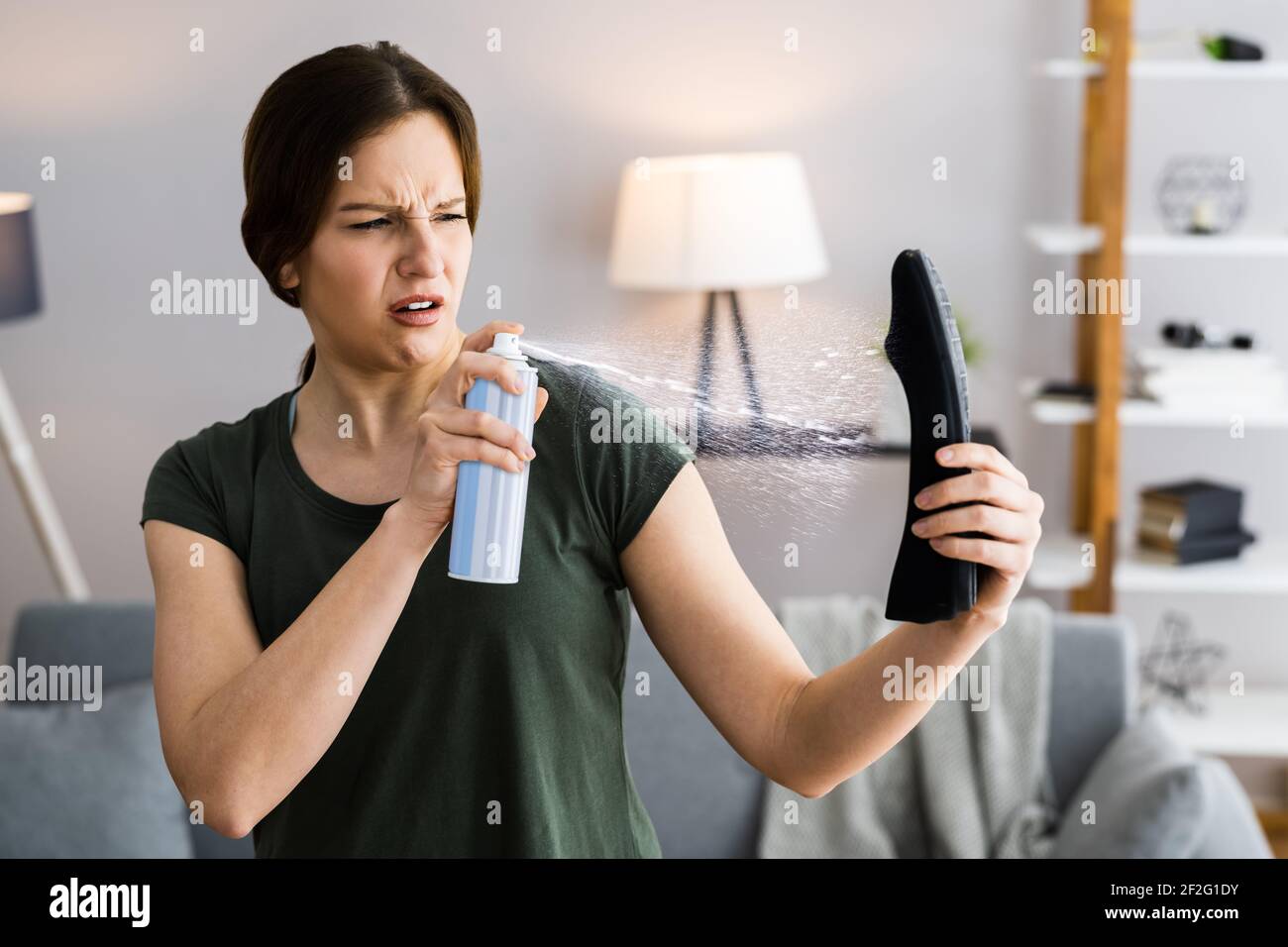 Shoe Spray Deodorizer Bottle. Muddy Shoes Deodorant Stock Photo Alamy