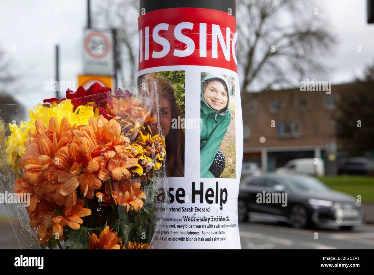 London, UK, 12 March 2021: Flowers and letters have been left in tribute to the murdered woman Sarah Everard on Poynders Road close to where she was last seen. Anna Watson/Alamy Live News Stock Photo