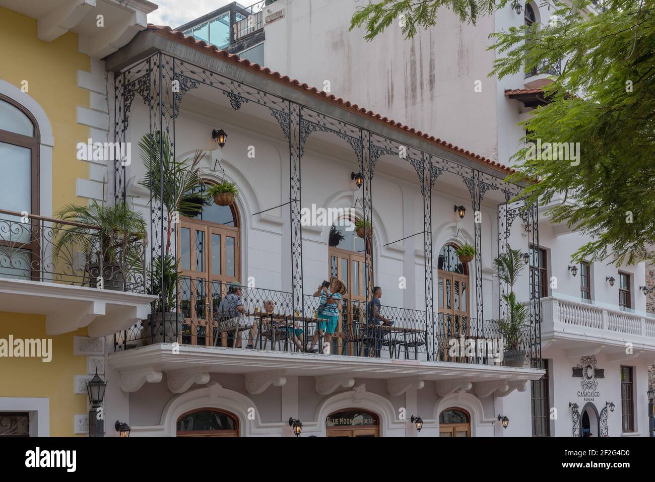 unidentified people on a balcony in Casco Viejo, historic center, of Panama City Stock Photo