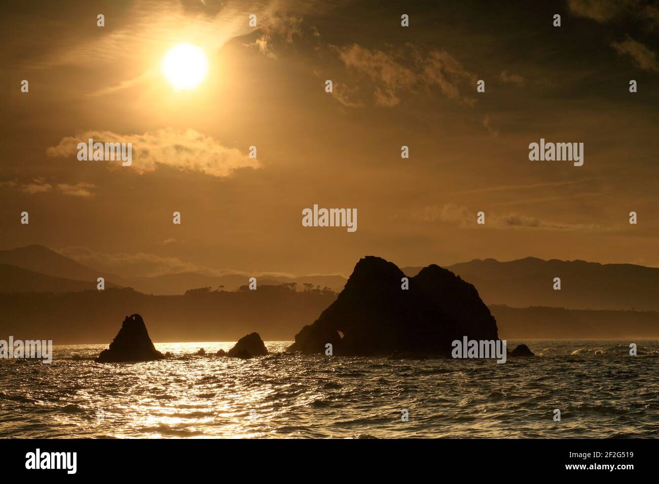 geography / travel, Spain, Asturias, Sunset over the rocks of Bozo beach on the Cantabria cos, Additional-Rights-Clearance-Info-Not-Available Stock Photo