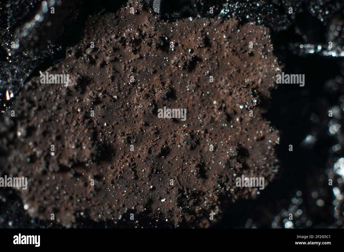 Tar and black tar deposits in the chimney close-up, macro photography Stock Photo