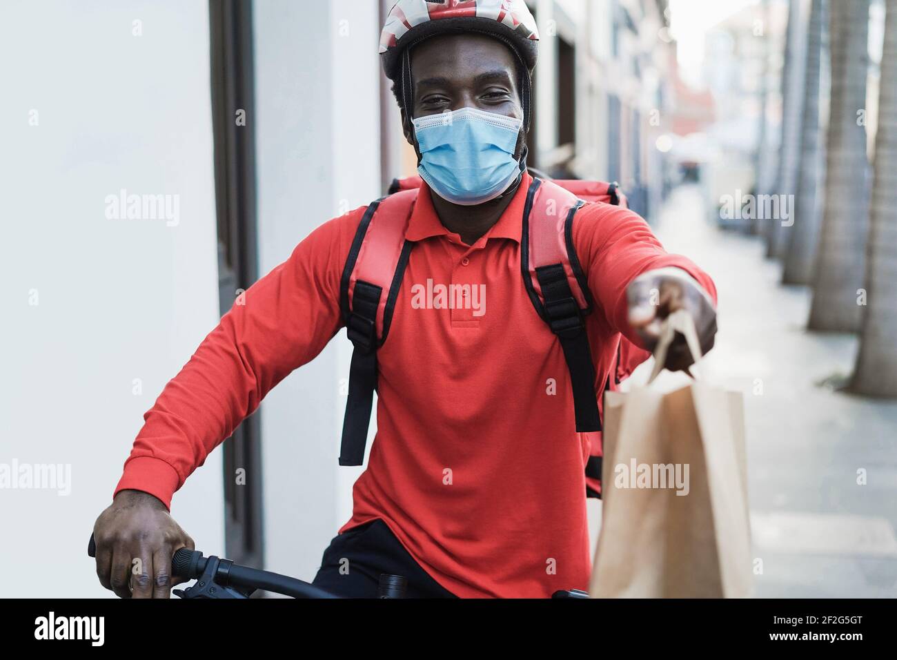 African rider man delivering meal hi-res stock photography and images ...