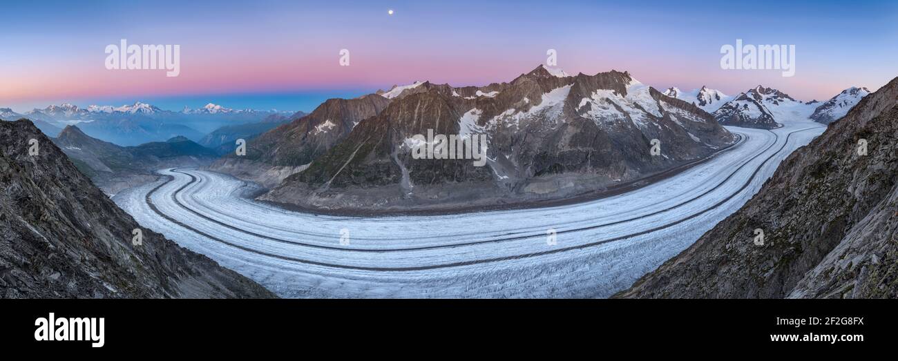 geography / travel, Switzerland, Valais, Moonset under dawn light over the immense Aletsch glacier dom, Additional-Rights-Clearance-Info-Not-Available Stock Photo