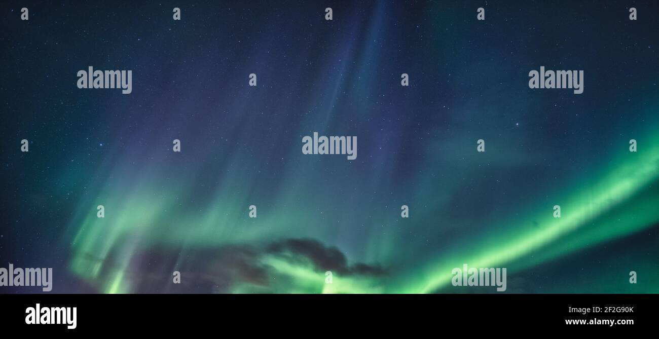 Aurora Borealis, Northern Lights with starry glowing in the night sky ...