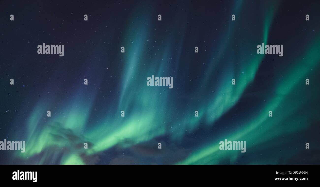 Aurora Borealis, Northern Lights with starry glowing in the night sky ...